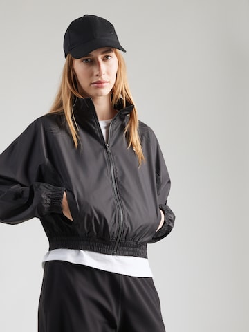 UNDER ARMOUR Athletic Jacket 'Woven' in Black: front