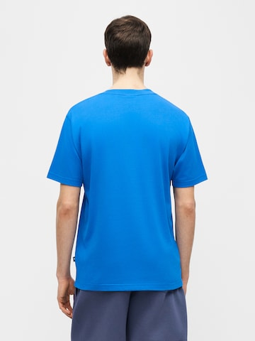 new balance T-shirt 'MT61018I' i blå