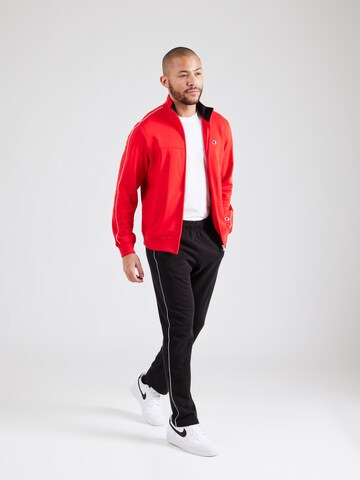 Tuta da jogging di Champion Authentic Athletic Apparel in rosso