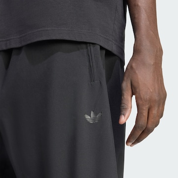 ADIDAS ORIGINALS Loosefit Broek 'Firebird' in Zwart