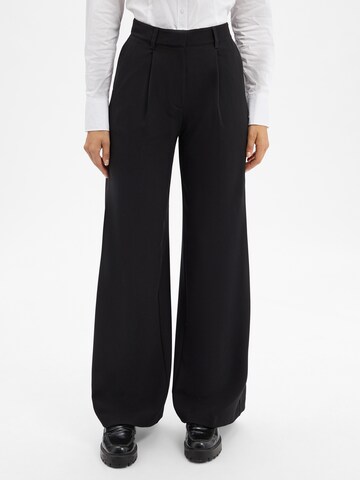 BOSS Regular Trousers in Black: front