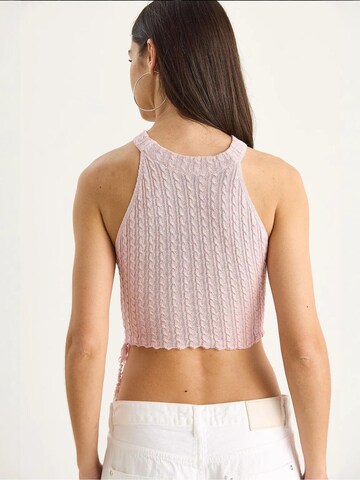 Top in maglia di Bianco Lucci in rosa