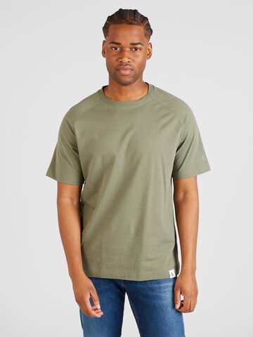 Tricou de la Calvin Klein Jeans pe verde: față