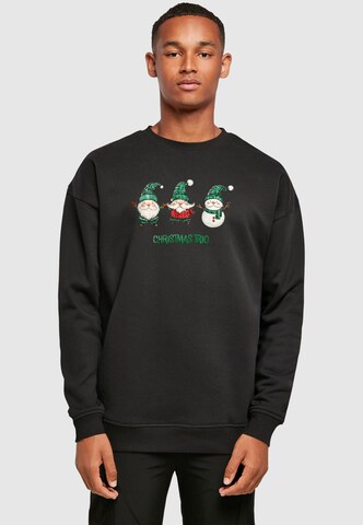 Merchcode Sweatshirt 'Christmas Santa Trio' in Black: front
