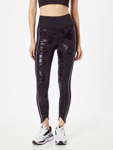 Skinny Pantalon de sport PUMA en noir : devant