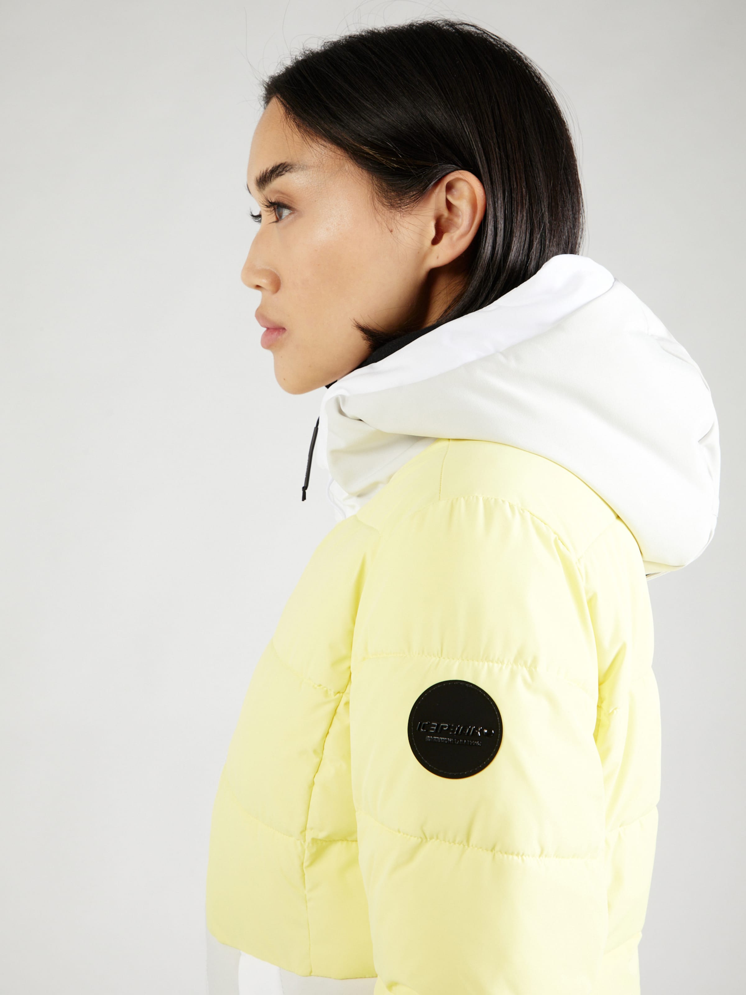 Veste de sport EDEN ICEPEAK en Jaune Pastel ABOUT YOU