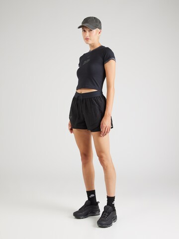 NIKE - Slimfit Pantalón deportivo en negro