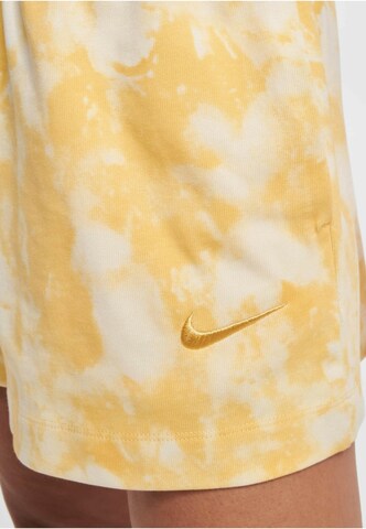 Nike Sportswear Loose fit Pants in Yellow