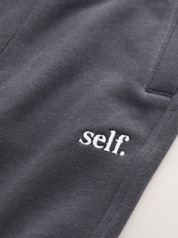 self. Tapered Hose in Blau