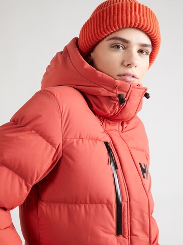 Manteau d’hiver 'ADORE' HELLY HANSEN en rouge