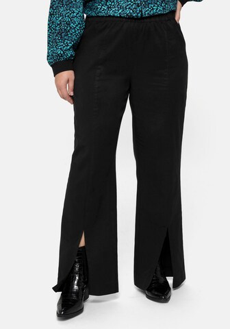 SHEEGO Flared Pants in Black: front