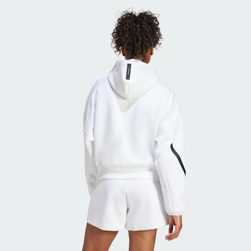ADIDAS SPORTSWEAR Спортна жилетка с качулка 'Z.N.E.' в бяло