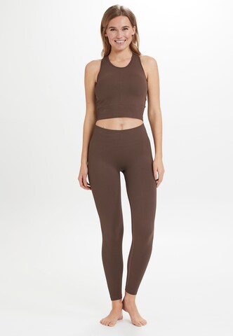 Athlecia Skinny Tights 'Flow' in Braun