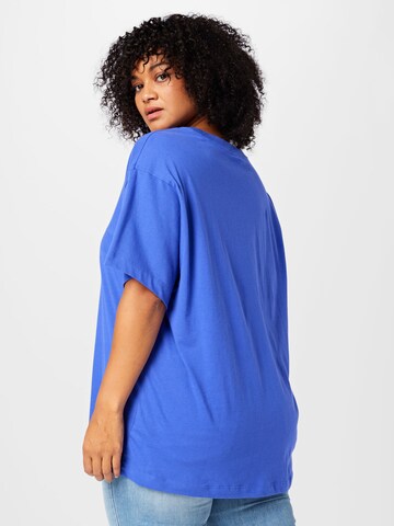 Nike Sportswear Performance shirt in Blue