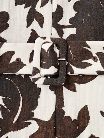 Salopeta 'Simba' de la MANGO pe bej