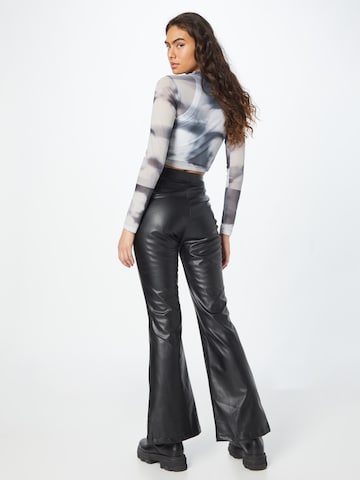 Trendyol Flared Pants in Black