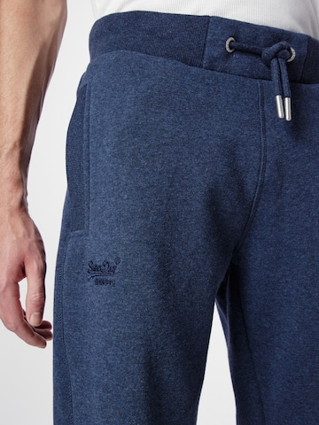 Superdry Tapered Broek 'Essential' in Blauw