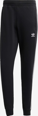 ADIDAS ORIGINALS Tapered Pants in Black: front