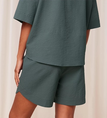 TRIUMPH Pyžamové nohavice - Zelená