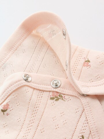Next - Pijama entero/body en rosa