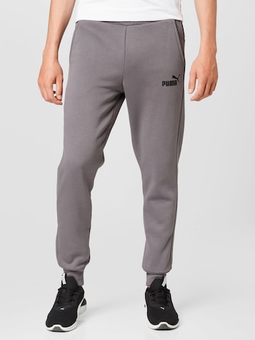 Tapered Pantaloni sportivi di PUMA in grigio: frontale