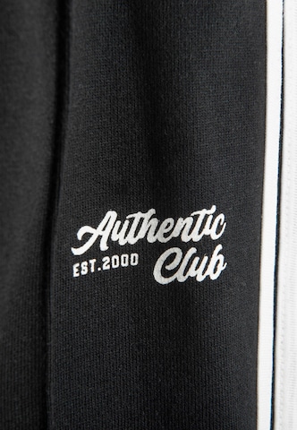 Cool Club - Acampanado Pantalón deportivo en negro