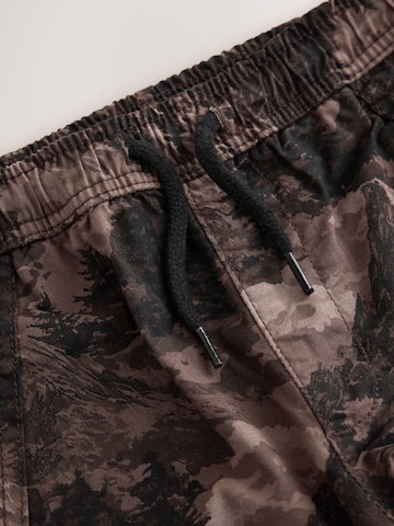 Next - Tapered Pantalón en Mezcla de colores