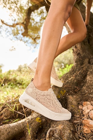 Baskets basses Rieker en beige