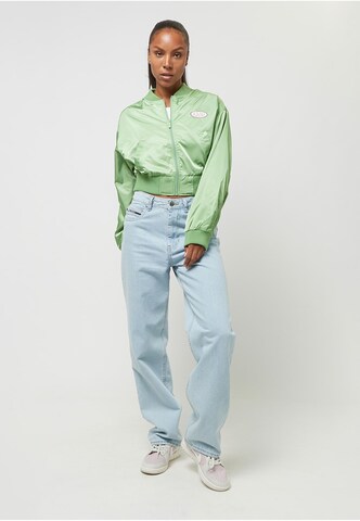 Veste mi-saison 'Woven Signature Short OS' Karl Kani en vert