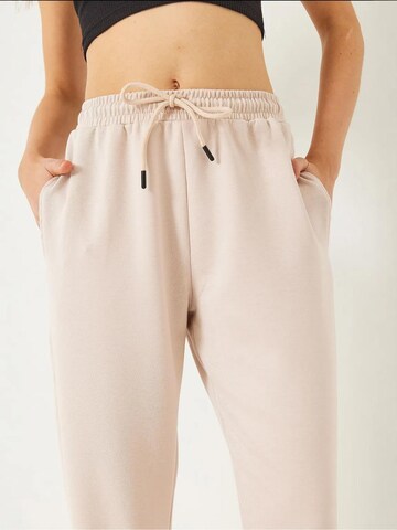 Bianco Lucci - Tapered Calças em bege