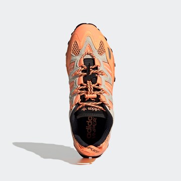 Baskets basses 'Hyperturf' ADIDAS ORIGINALS en orange