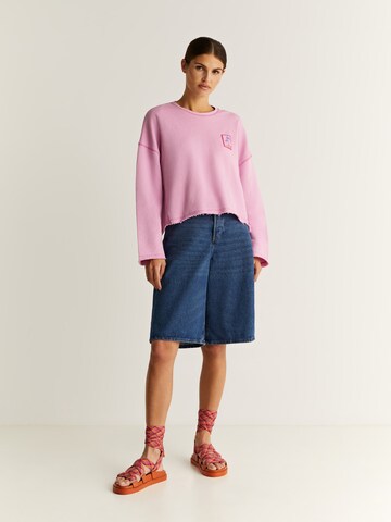 Sweat-shirt 'Palm Label' Scalpers en rose : devant