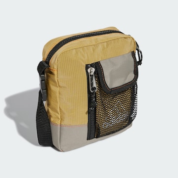 ADIDAS ORIGINALS Crossbody bag in Yellow