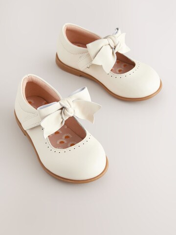 Next - Bailarina en blanco