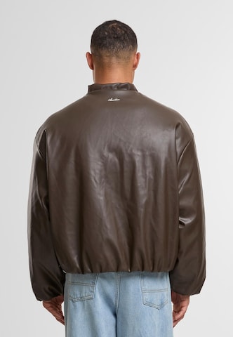 Another Cotton Lab Between-season jacket in Brown