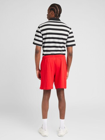Nike Sportswearregular Hlače 'Club' - crvena boja