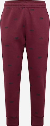 Nike Sportswear Tapered Pants in Brown: front