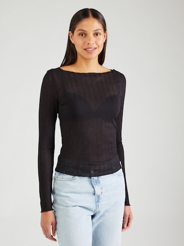 Tricou de la Calvin Klein Jeans pe negru: față