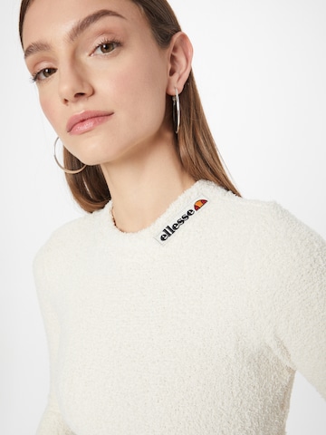 ELLESSE كنزة صوفية بلون أبيض