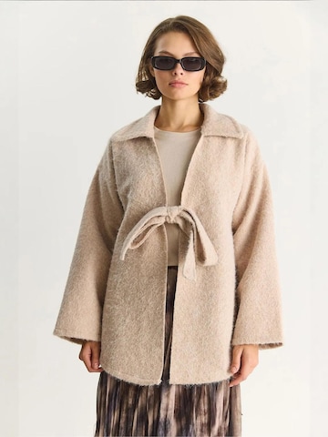 Cardigan Bianco Lucci en beige