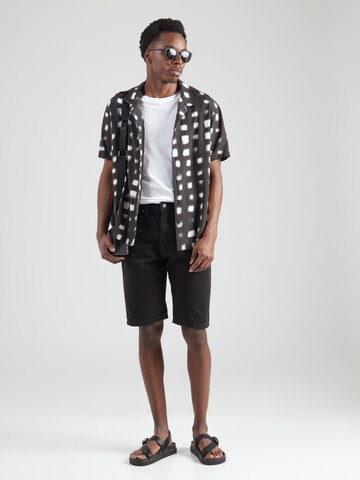 LEVI'S ® Loosefit Jeans '469' in Zwart