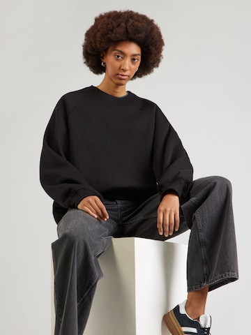 WEEKDAYSweater majica 'Viva' - crna boja: prednji dio