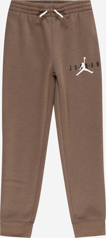 Jordan Tapered Trousers in Brown: front