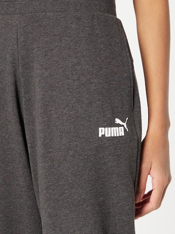 PUMA Конический (Tapered) Спортивные штаны 'ESSENTIAL' в Серый