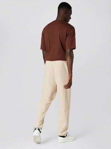 Sinned x ABOUT YOU Loose fit Trousers 'Milo' in Beige
