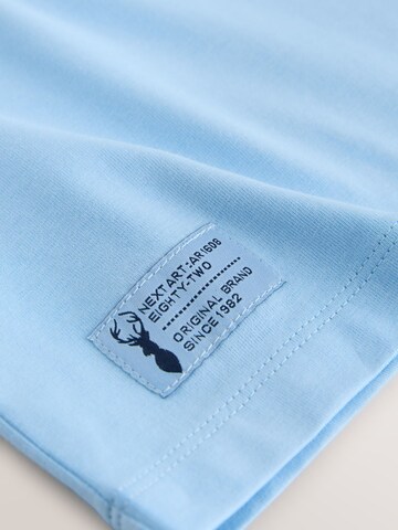 Next - Camiseta en azul
