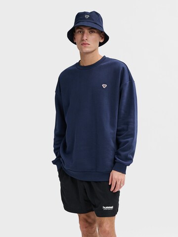 Sweat-shirt Hummel en bleu : devant