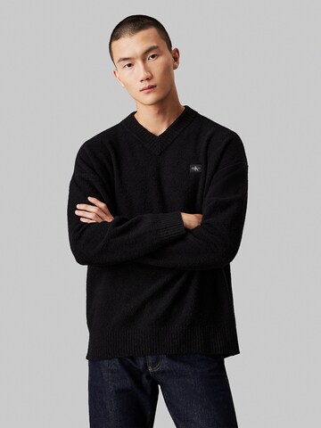 Pull-over Calvin Klein Jeans en noir : devant