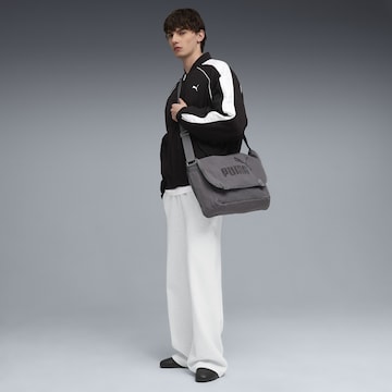 PUMA Jacke 'T7' in Schwarz