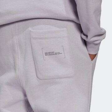 ADIDAS SPORTSWEAR Normalny krój Spodnie sportowe 'Fleece' w kolorze fioletowy